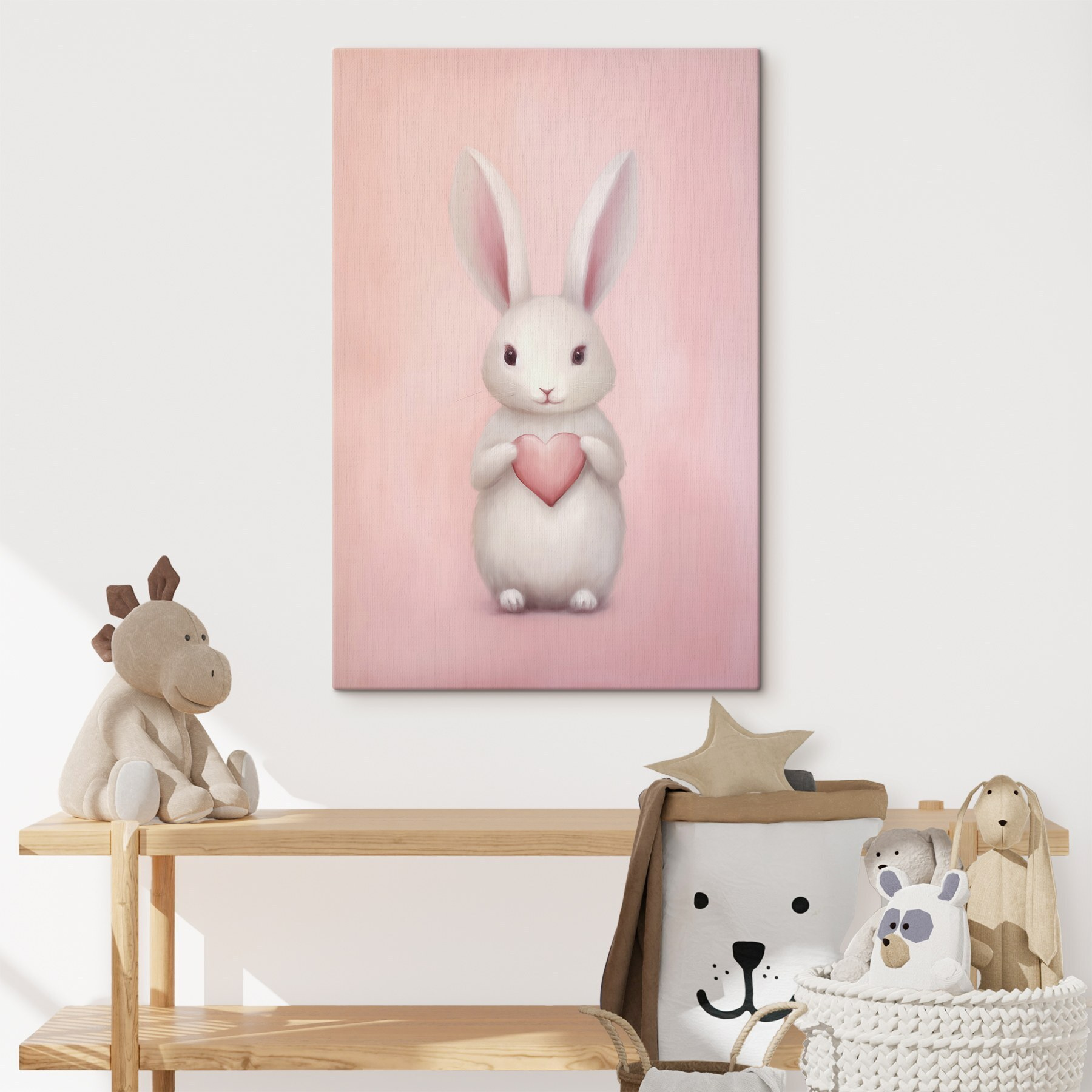 White rabbit holding a heart