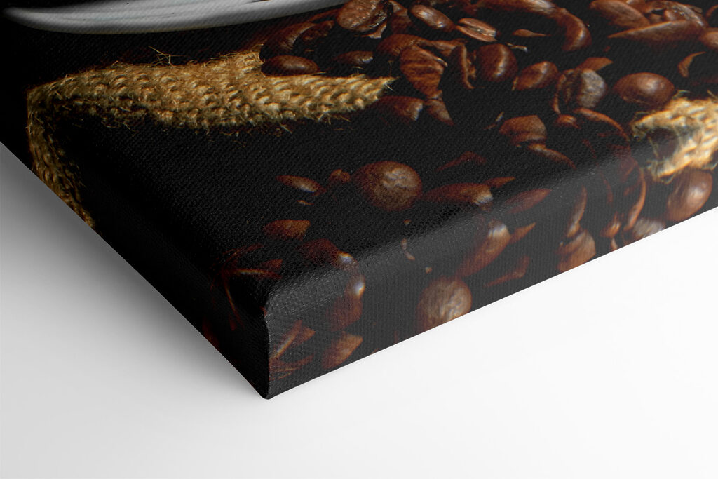 A cup of coffee with smoke on a saucer and beans A cup of coffee with smoke on a saucer and beans